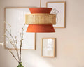 Lustre bohème en bambou, cannage et tissu terracotta