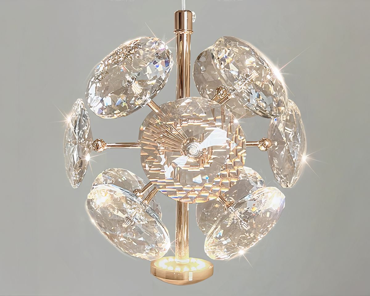 Petit lustre boule à facettes de cristal et métal doré