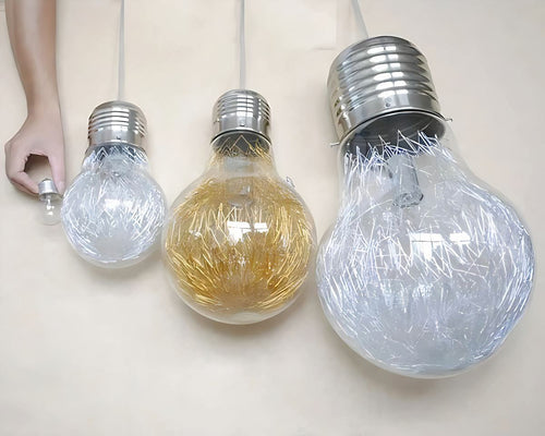 Lustre ampoule géante à reflets dorés ou argentés
